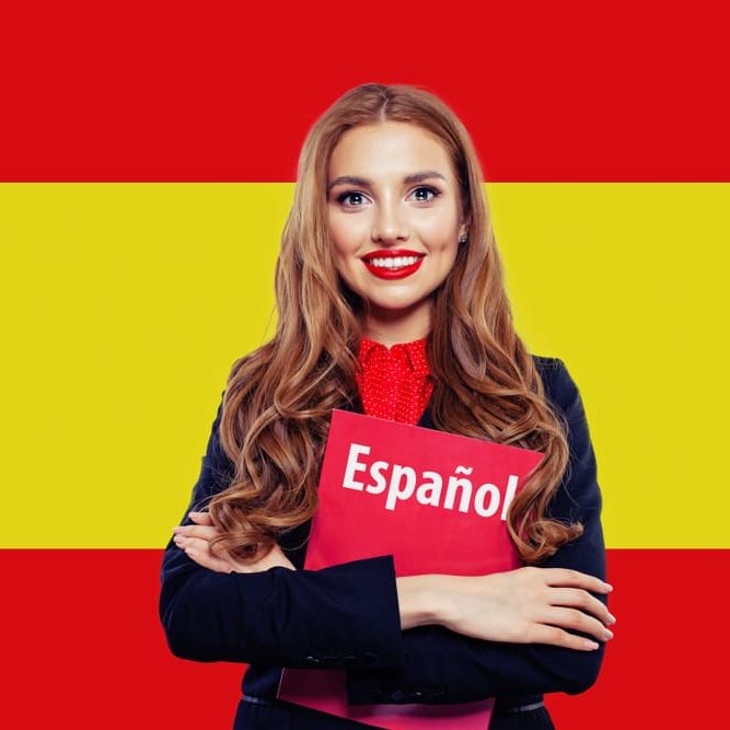 Spain.,Happy,Student,Girl,With,Red,Book,Against,The,Spanish